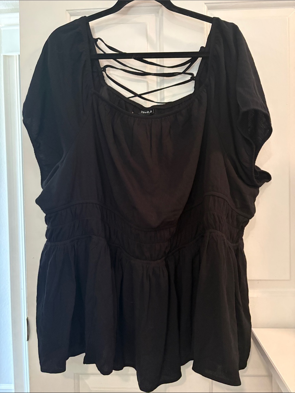 torrid Black Peplum Tunic with Lace Strappy Back